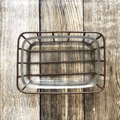 Glass soap dish in a metal basket